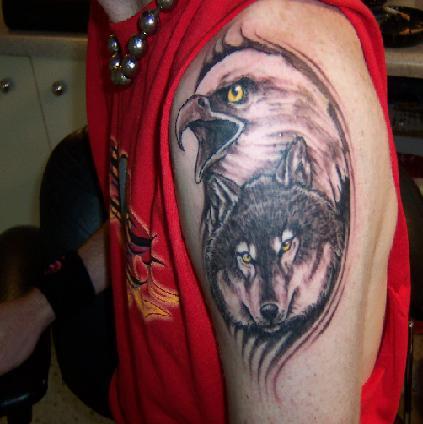 Photo:  wolf-head-and-eagle-tattoo-on-left-shoulder
